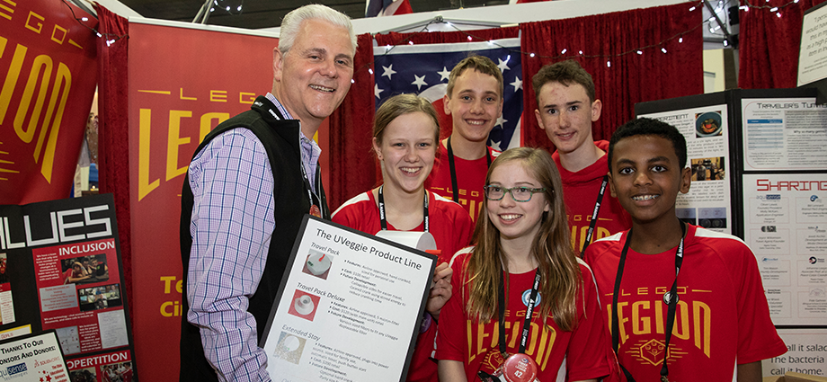 FIRST President Donald E. Bossi meets with FIRST LEGO League team “LEGO Legion” at FIRST Championship Detroit.