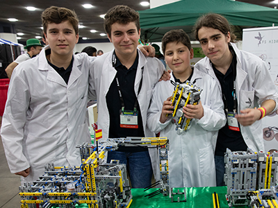 FIRST LEGO League team “FSINGENIUM” pose in the pits at FIRST Championship Detroit.