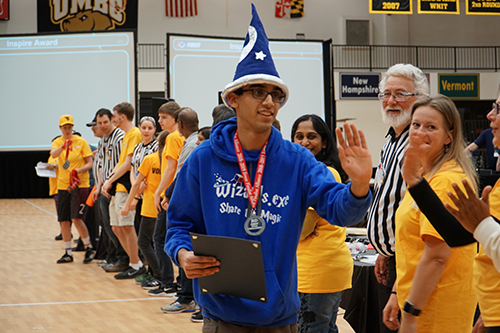 Ishaan Oberoi accepts the Dean’s List Finalist award at the 2019 FIRST Tech Challenge Maryland State Championship.