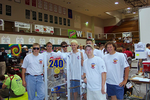 Author Rob Fyfe (far right) and his FIRST Robotics Competition team