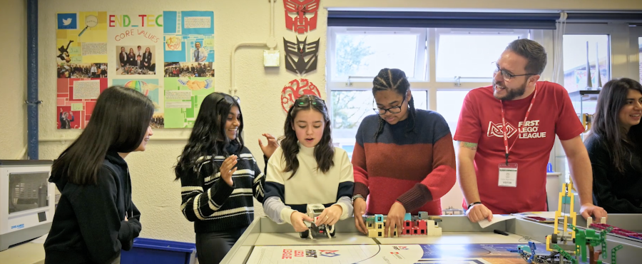 students participate in FIRST LEGO League in a classroom