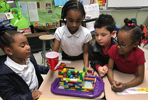 Students at the Early Learning Center in St. Martinville, Louisiana, work on their FIRST LEGO League Jr. model.