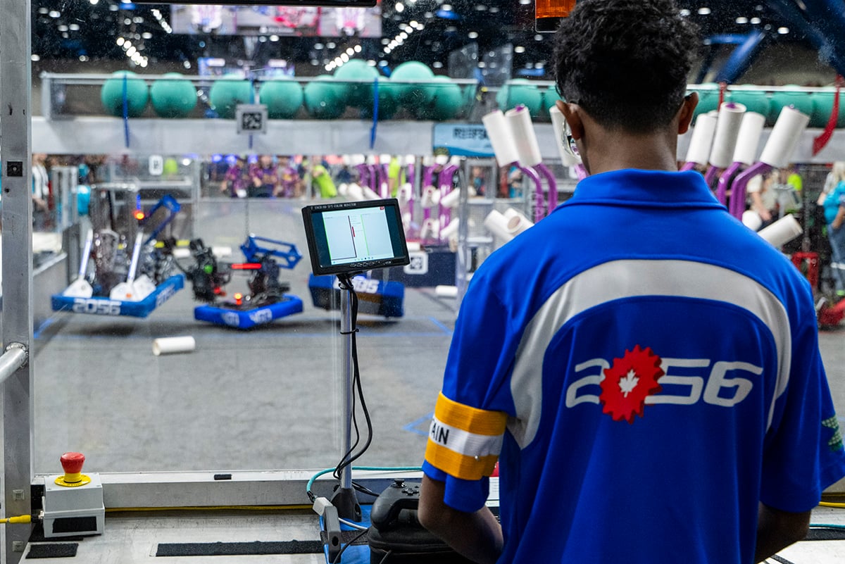 FIRST Robotics Competition student driving robot at FIRST Championship
