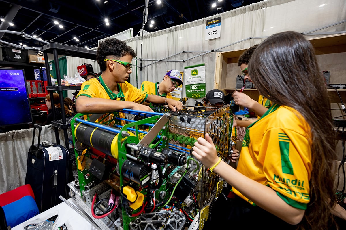 FIRST Robotics Competition students working on robot at the 2026 FIRST Robotics Competition