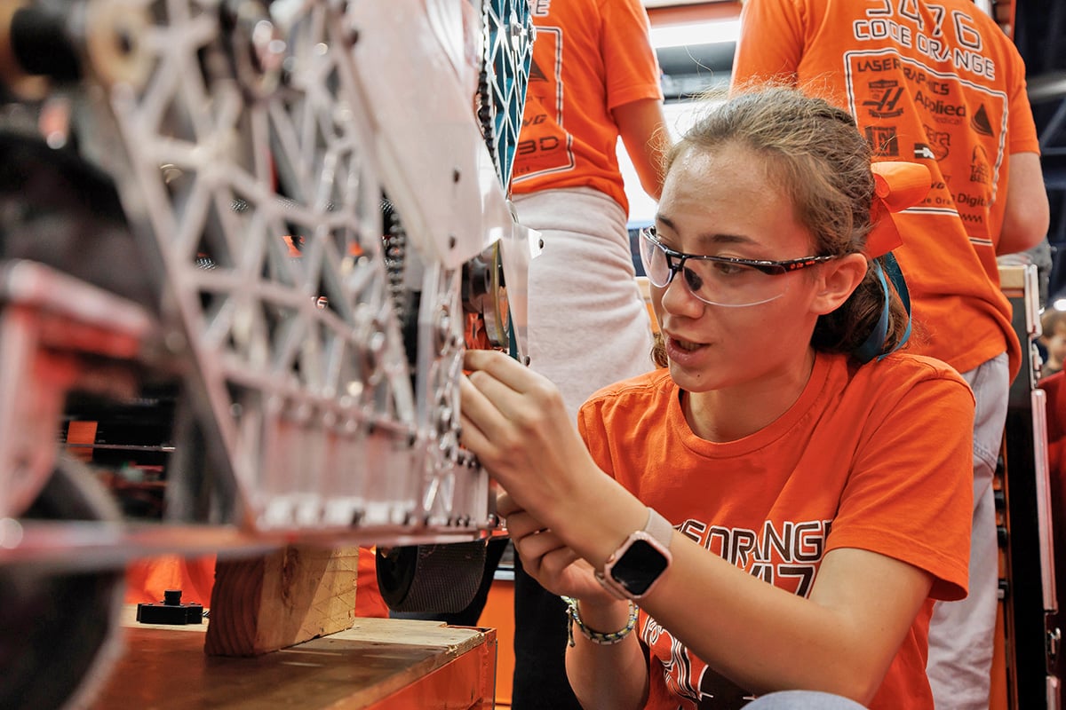 FIRST Robotics Competition student working on robot at the 2026 FIRST Robotics Competition