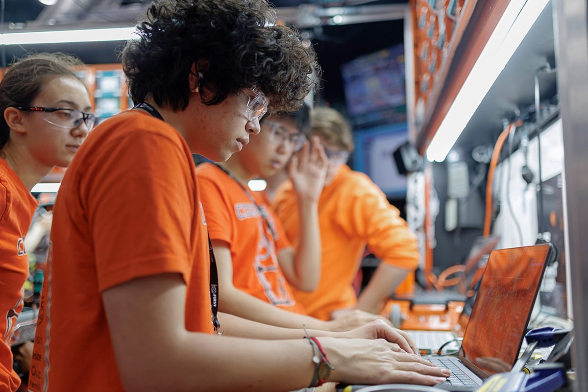 FIRST Robotics Competition team programs robot at 2026 FIRST Championship