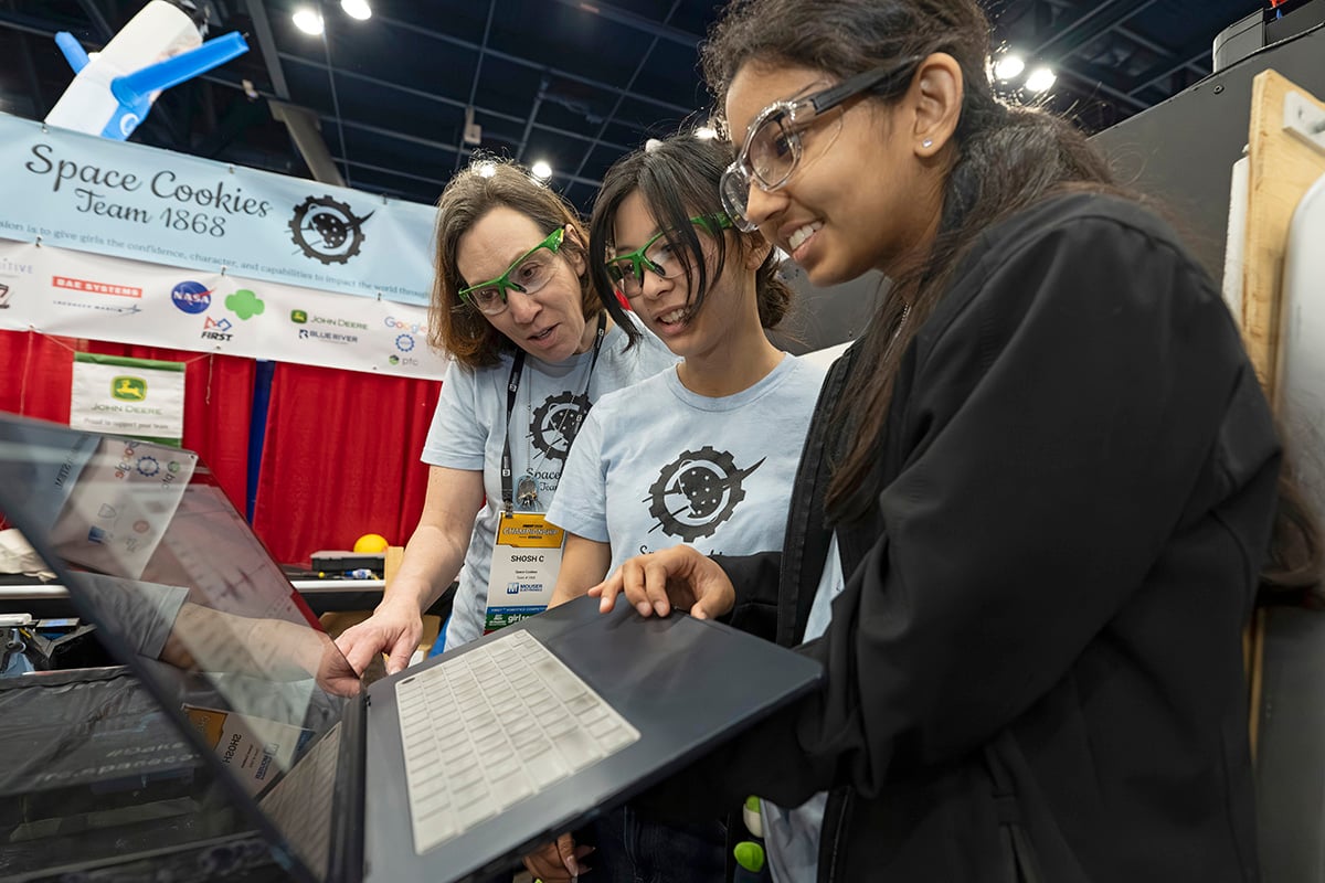 FIRST Robotics Competition team programs robot at 2026 FIRST Championship with help from mentor