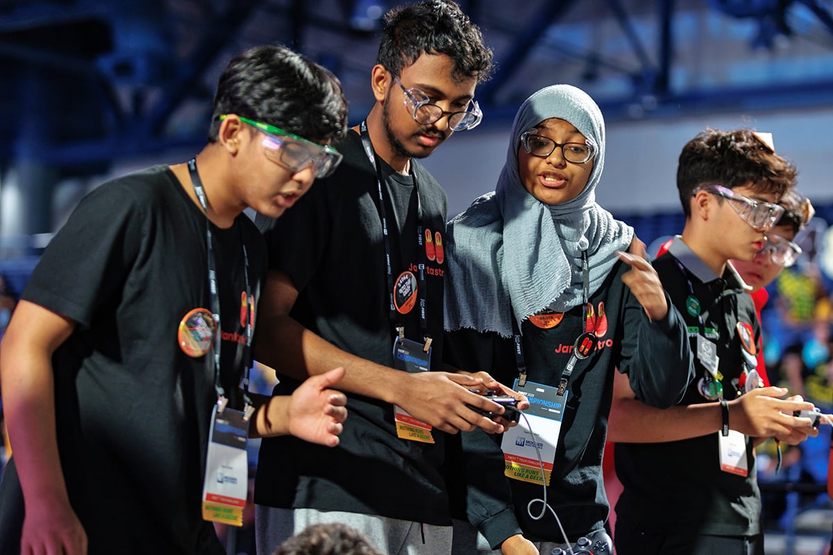 FIRST Tech Challenge students driving their robot at FIRST Championship