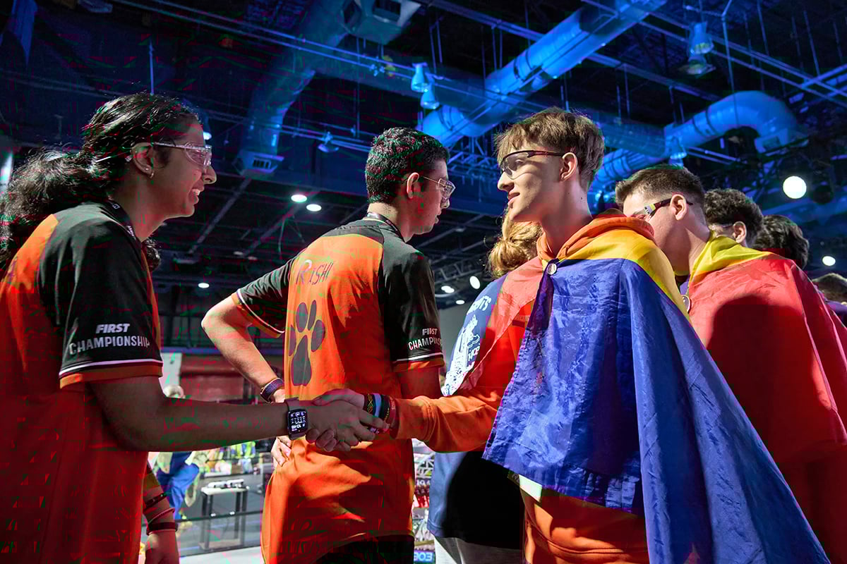 FIRST Tech Challenge students shake hands at FIRST Championship