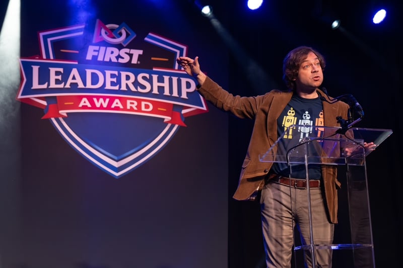 FIRST® alum, robotics professor, and Survivor 50 fan favorite, Christian Hubicki, presented at the FIRST Leadership Award Ceremony and engaged with teams, mentors, volunteers, and supporters at the FIRST Championship in Houston.