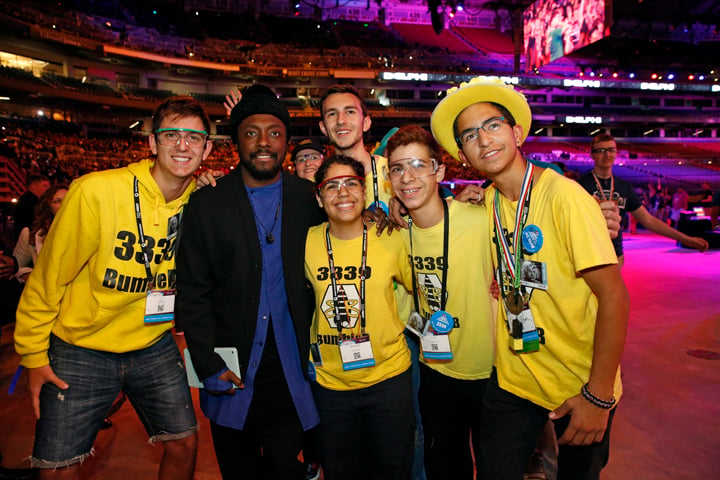 will.i.am on the field with a FIRST team at the 2016 FIRST Championship.