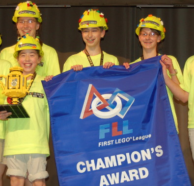 TJ Evarts (center) and his FIRST LEGO League team, “The Inventioneers”