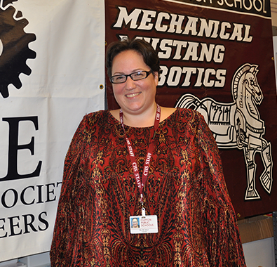 STEM teacher and robotics coach Monique Dituri poses in her classroom in Clifton, NJ.