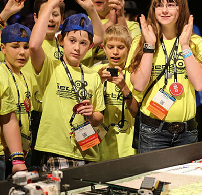 FIRST LEGO League team cheering