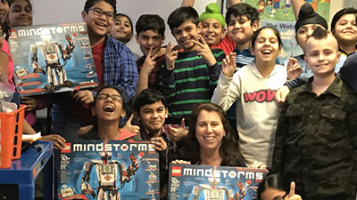 Group of kids with LEGO MINDSTORMS robotics kit