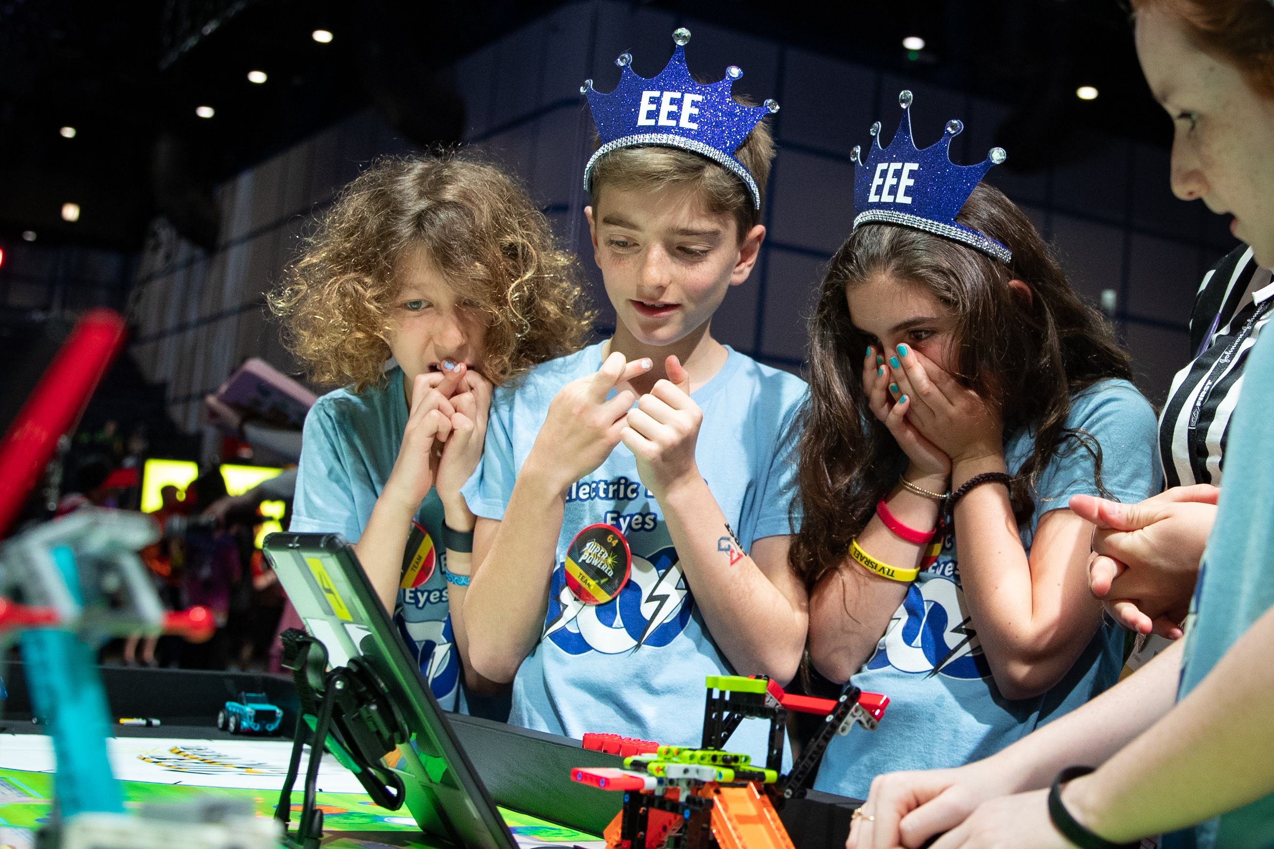 SUPERPOWERED excitement! A FIRST LEGO League team awaits match results on April 21 at the 2023 FIRST Championship in Houston.