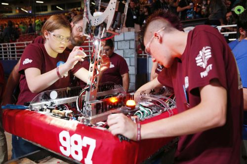 Figure 4. FIRST Robotics Competition participants, ages 14–18, have six weeks to build a 120-pound robot for a theme-based game that changes each year. (Source: Adriana M. Groisman, courtesy of FIRST.)