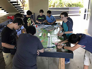 FIRST LEGO League team working on their robot