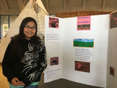 Alexander First Nation Kipohtakaw Education Centre student presents her team’s FIRST LEGO League project about gopher holes on the reserve