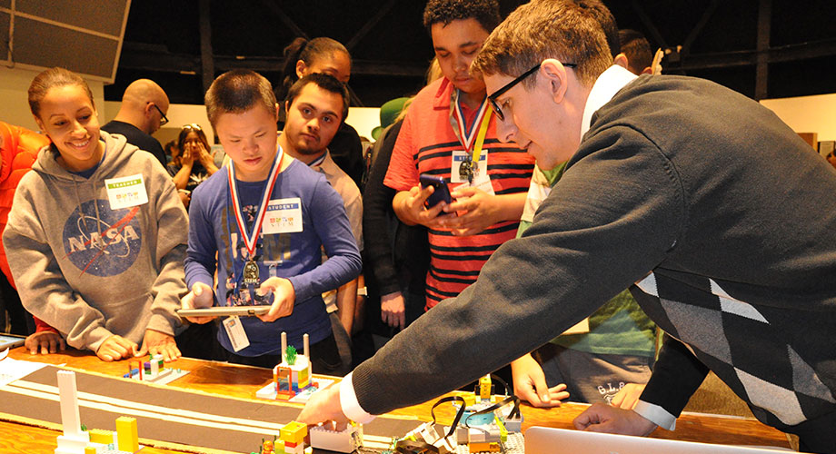 Team “Water Warriors” operate the team’s app-controlled LEGO model at District 75’s FIRST LEGO League Jr. Expo at the New York Hall of Science.