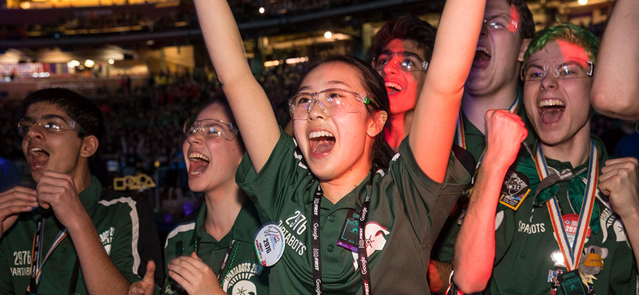 Students celebrate on the field at the 2018 FIRST Championship. 