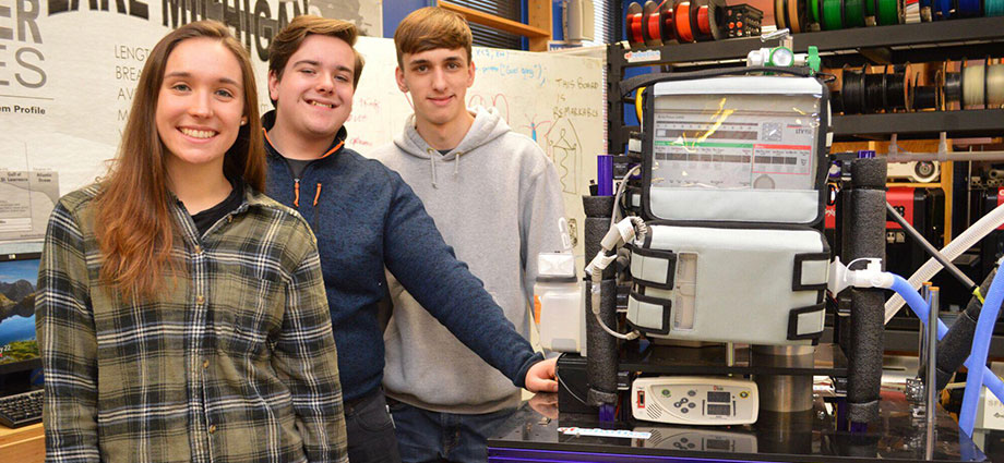 SFROBOTICS students with Vivian’s robot (Photo by Jennifer Kresse)