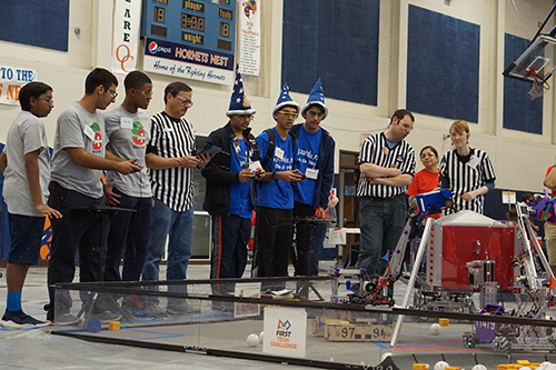 Ishaan and his alliance compete in a FIRST Tech Challenge match.
