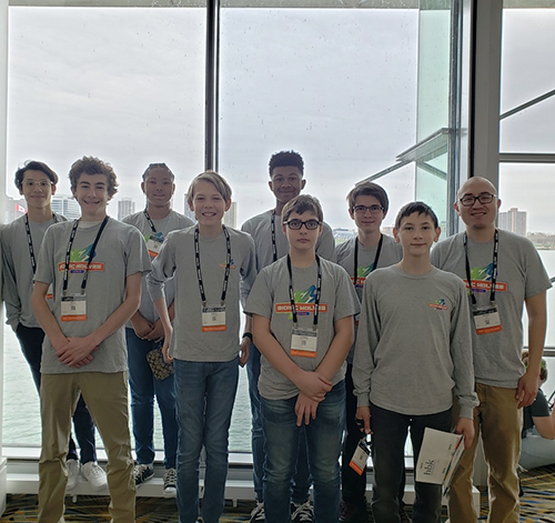 Students from FIRST Tech Challenge team “Bionic Wolves” and their coach Kenny Bae at the 2019 FIRST Championship, presented by Qualcomm, in Detroit. The team led a conference session titled “Students with Learning Differences Can Succeed in FIRST.