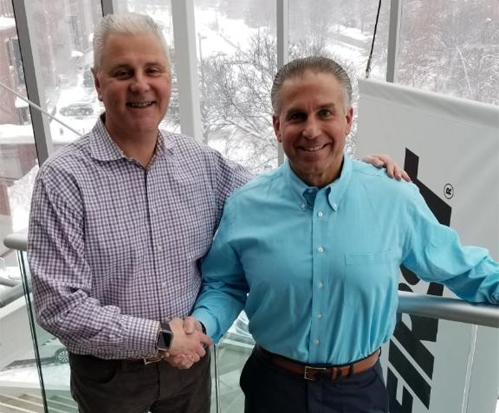 Outgoing President Don Bossi with Incoming President Larry Cohen at FIRST headquarters in Manchester, New Hampshire.