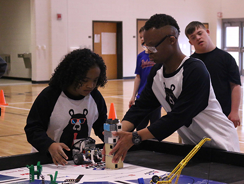 “The Dancing Bears” compete with their robot “Awesome Sauce” at the FIRST LEGO League Super Regional in Norcross, Georgia.