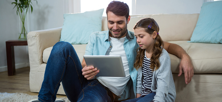 Student and parent engaged in remote learning