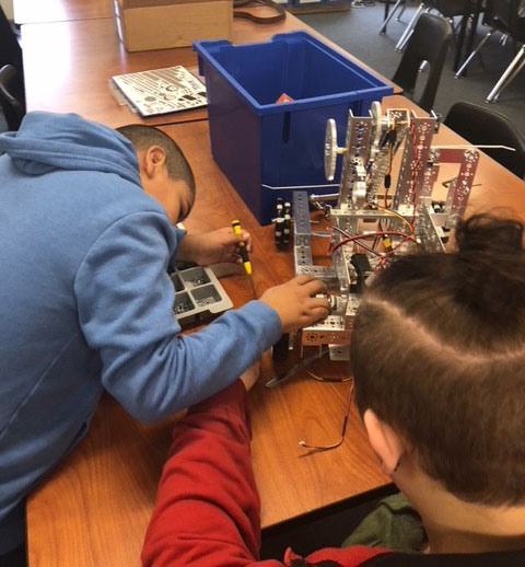 Students at Boys and Girls Haven in Louisville, Kentucky, build a robot for FIRST Tech Challenge.